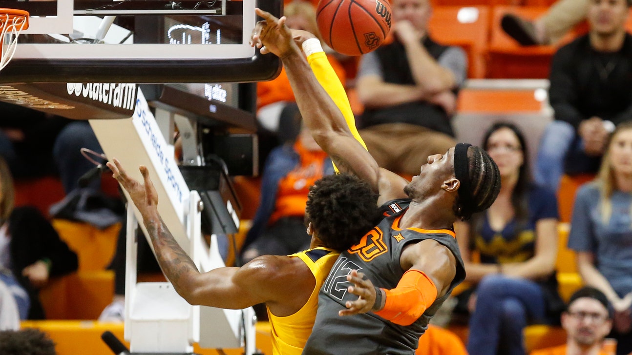 Balanced scoring, stifling defense lead WV over Okla. St.