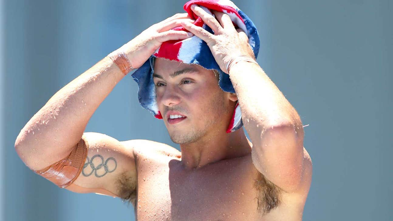 Olympic medalist who came out as bisexual now says he's gay