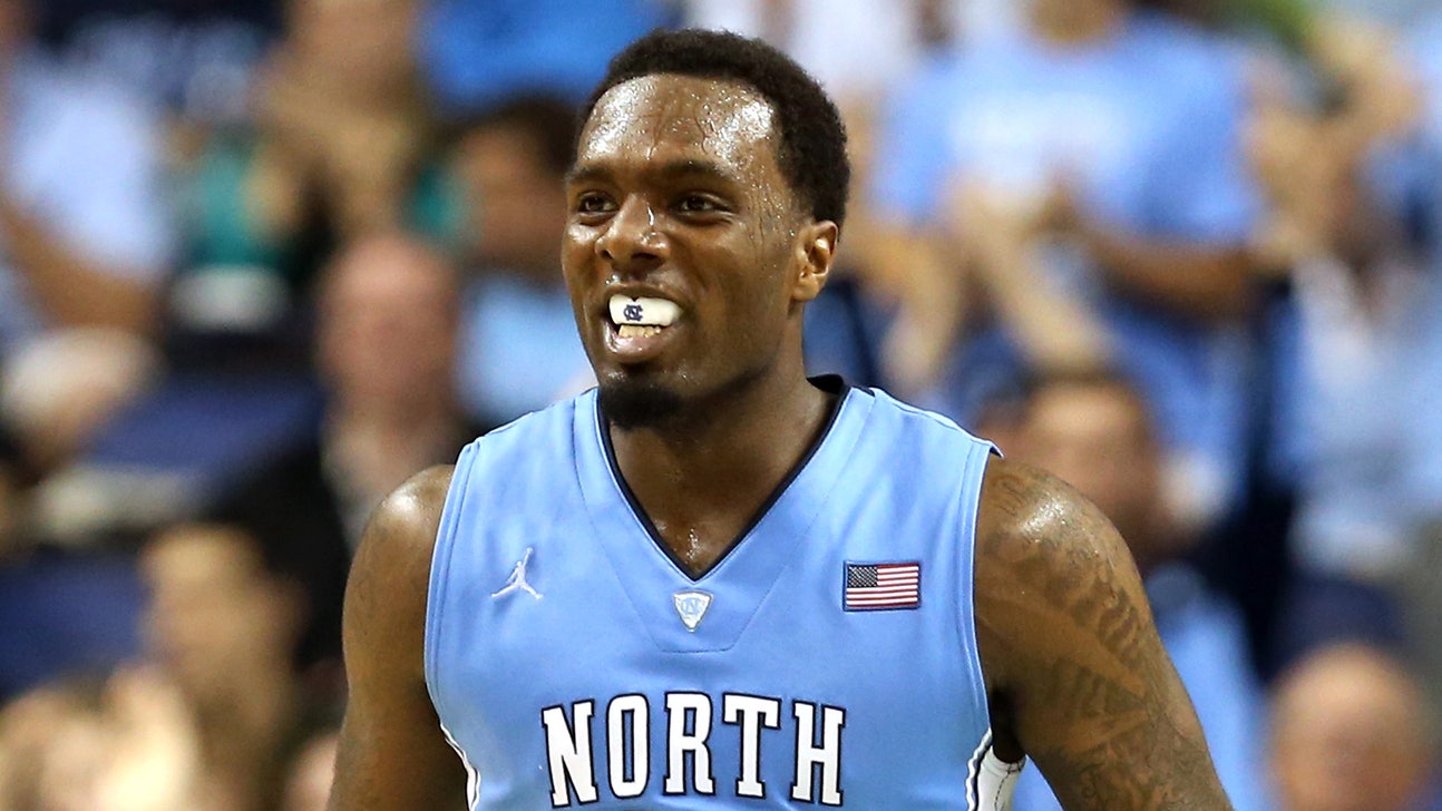 Duke fan shows no mercy to invading UNC backers, or their sign