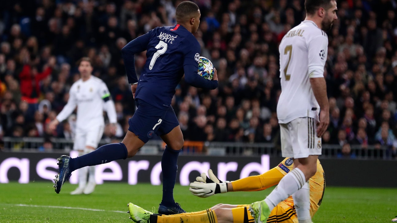 PSG rallies to draw 2-2 with Madrid and clinch 1st place