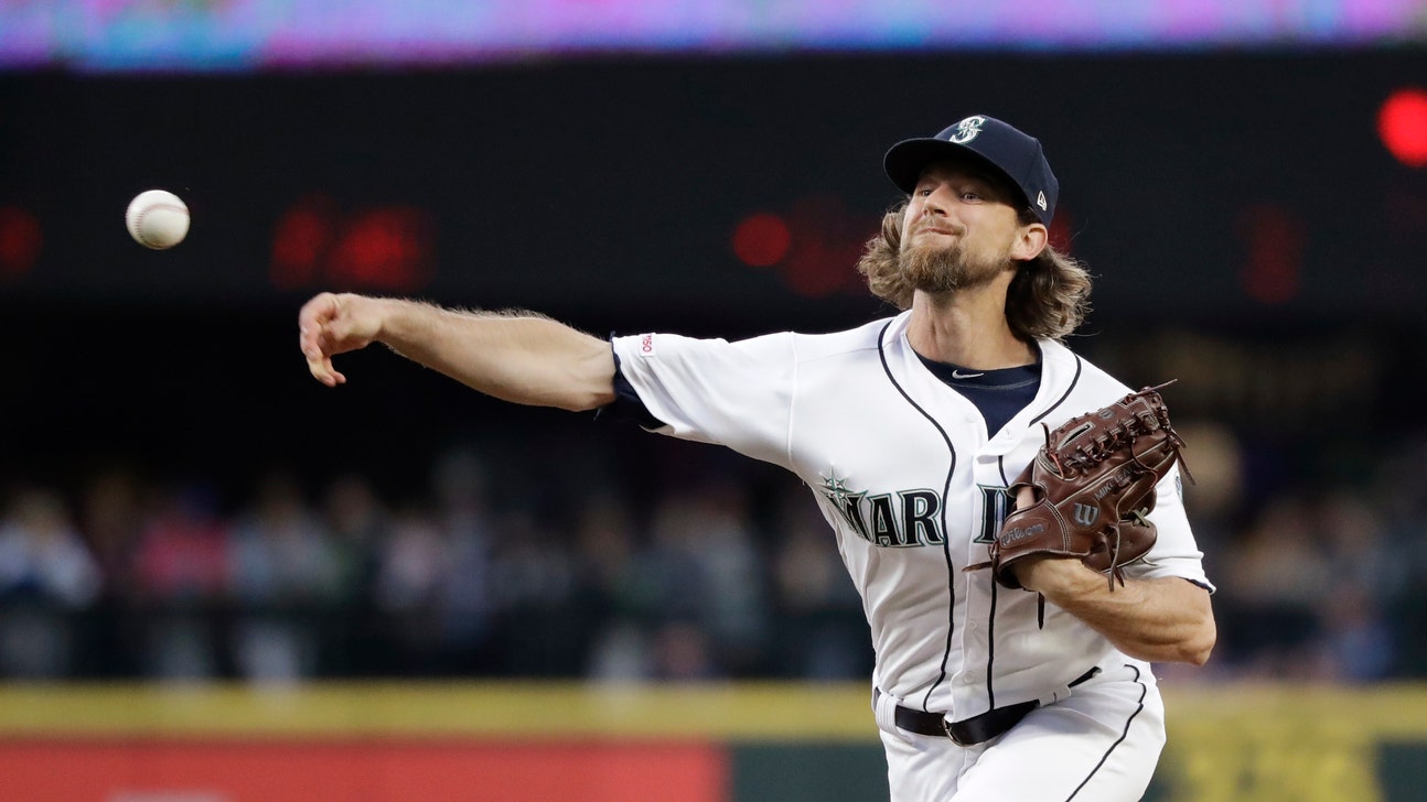 Cardinals rally for 5 in 9th to stun Mariners 5-2