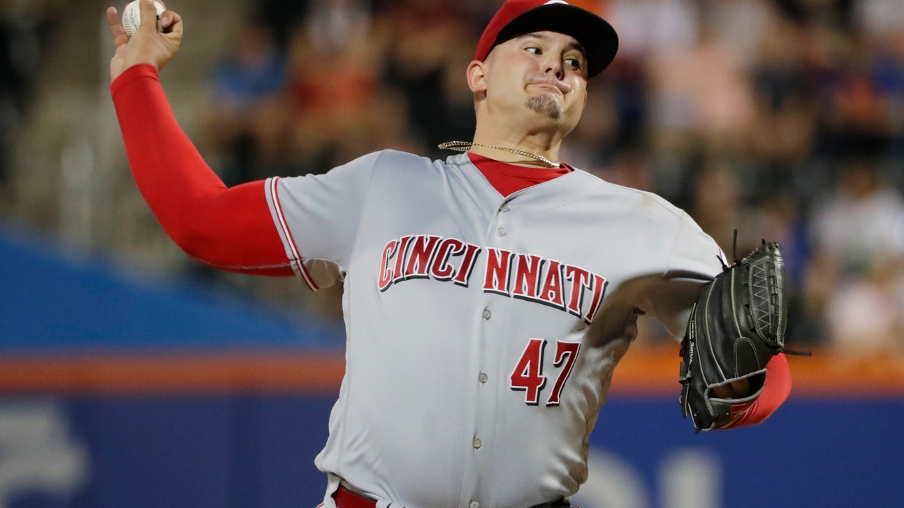 Romano wins in NY homecoming, Reds beat Mets 6-1