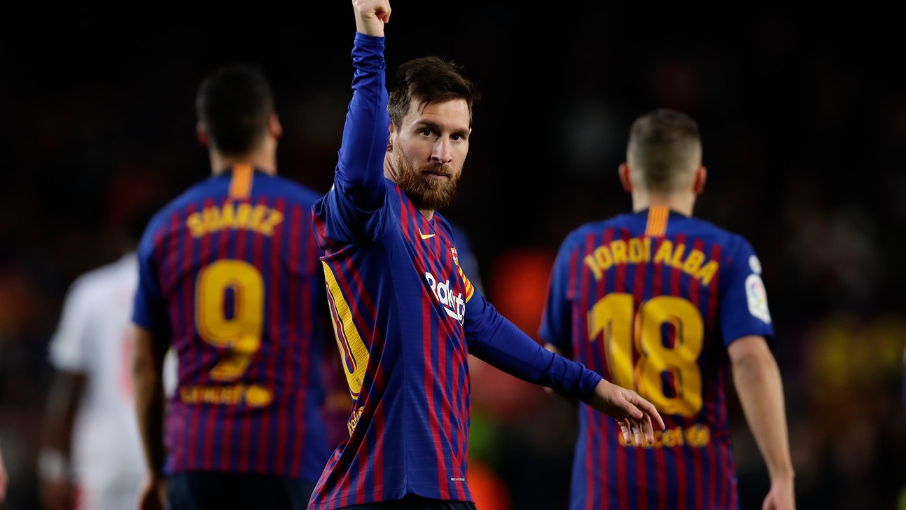 Griezmann scores to keep Atletico in hunt with Barcelona