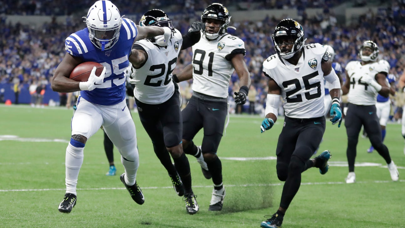 Colts’ Mack hurts hand; Bengals’ Tate has scary neck injury