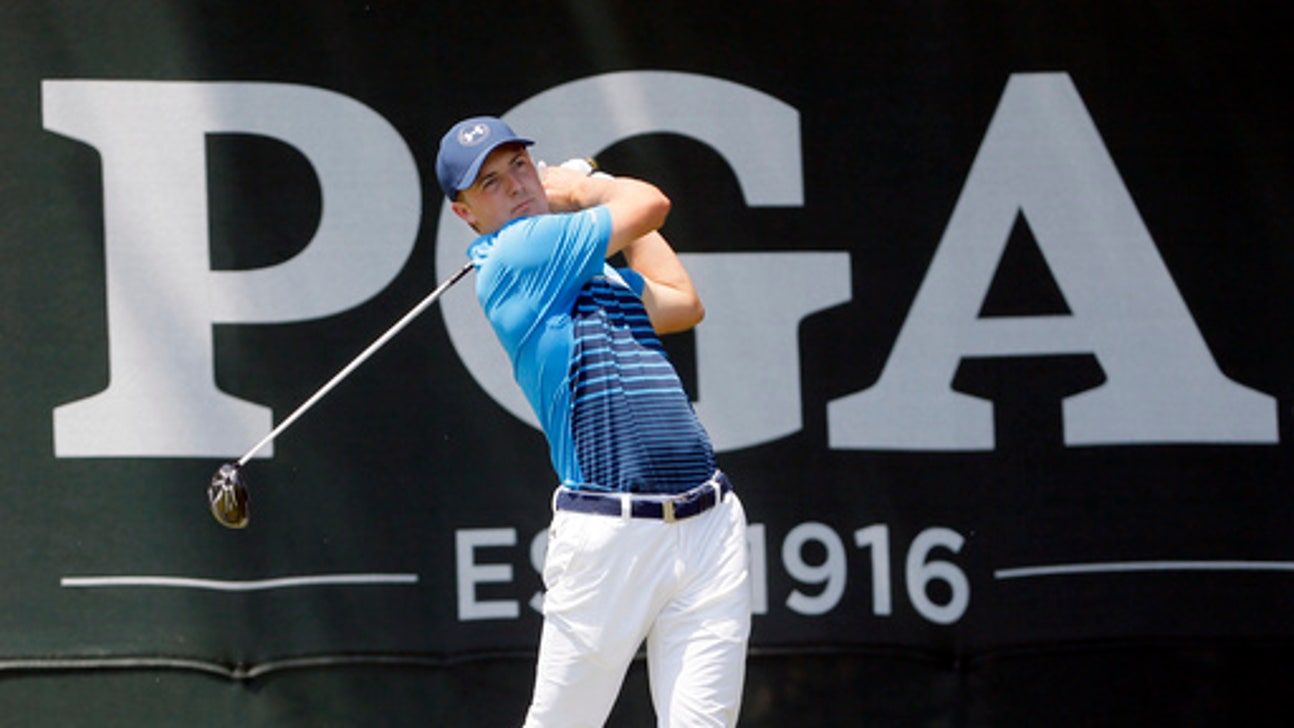 The Latest: Round 2 of PGA resumes amid rain at Baltusrol