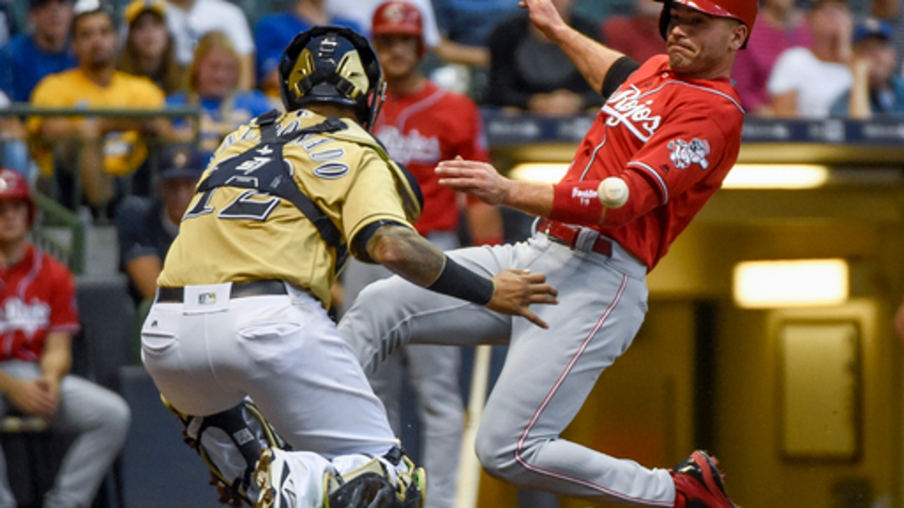 Suarez homers, Reds score 8 runs in 6th to beat Brewers 11-5