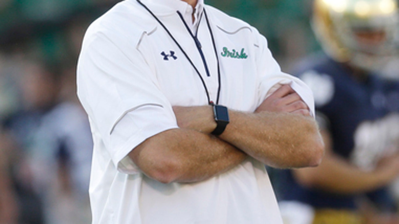 W. Kentucky hires Notre Dame assistant Mike Sanford as coach