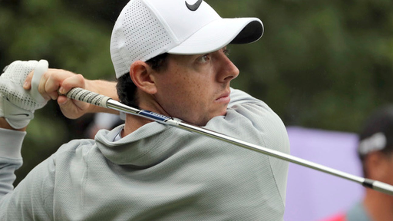 McIlroy withdraws from Abu Dhabi because of rib injury.