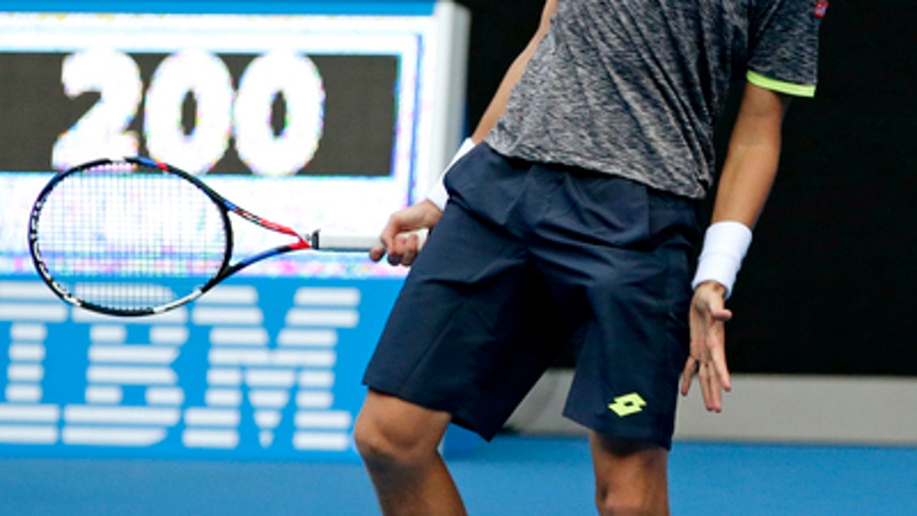 Istomin credits coach (and mother) for upset over Djokovic