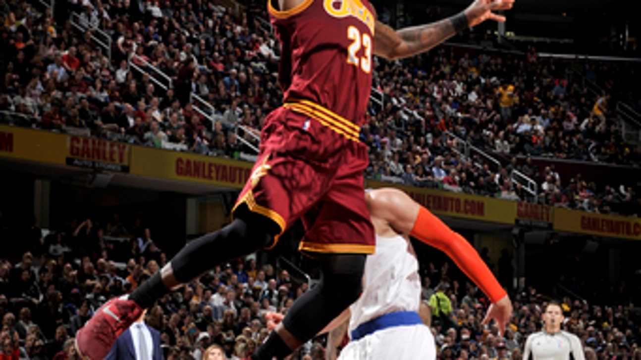 LeBron back with Cavs after missing game with strep throat