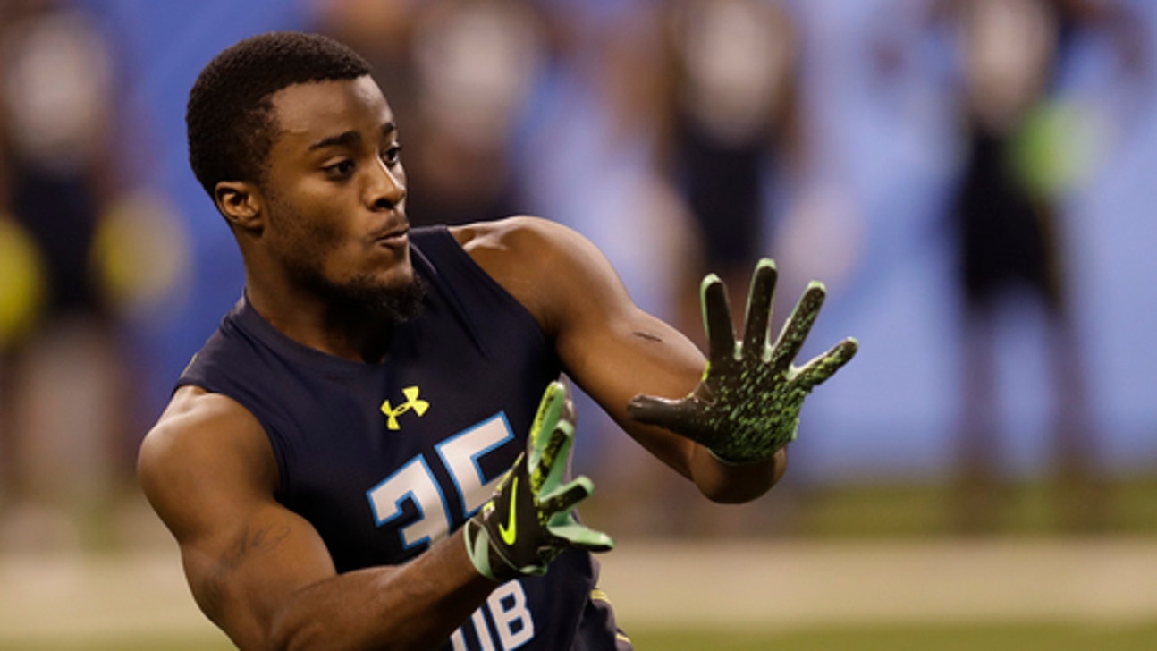 Former Michigan player Lewis charged with domestic violence