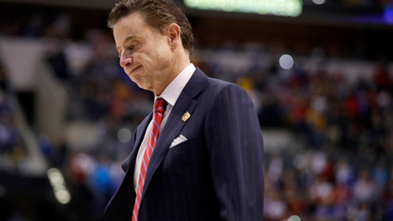NCAA suspends Louisville basketball coach Rick Pitino for 5 ACC games following sex scandal investigation