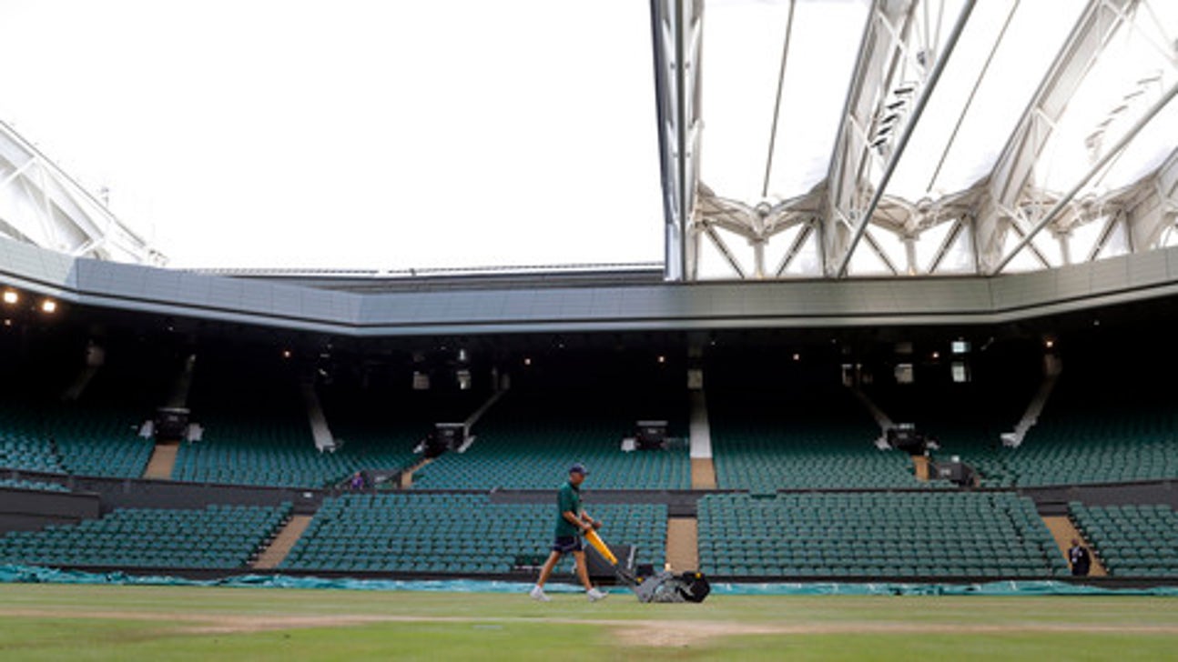 Every morning, they mow, paint, mop Wimbledon's grass courts