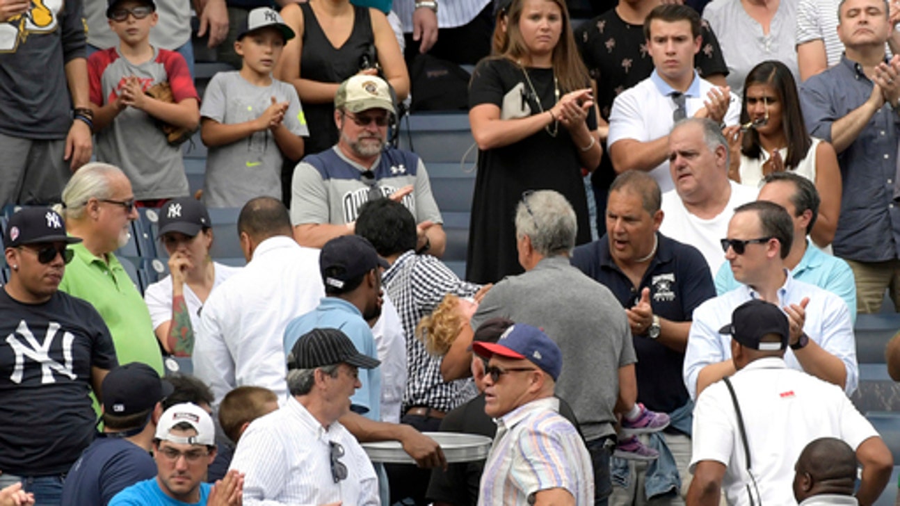 Girl hit by foul ball at Yankees game gets game's attention