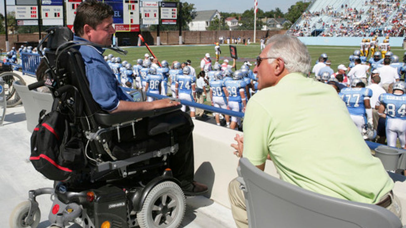 Paralyzed ex-player Marc Buoniconti assists ailing father