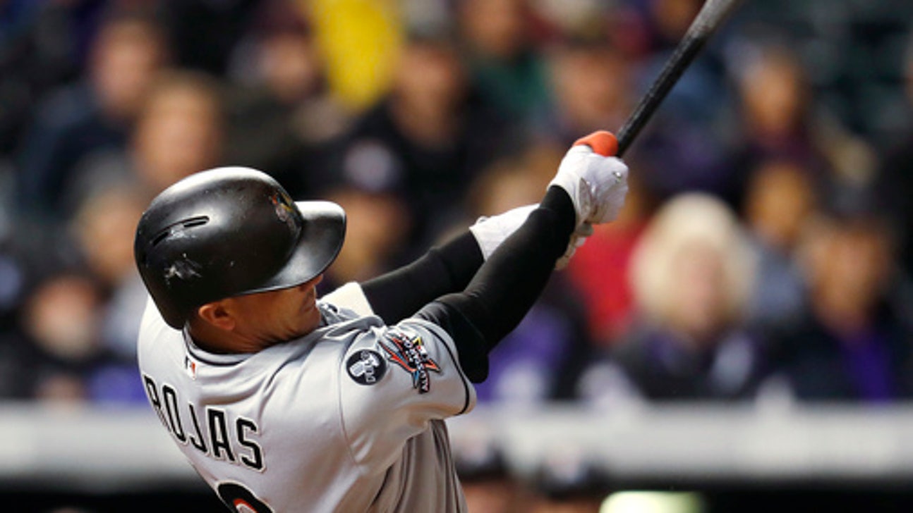 Rojas has 4 RBIs as Marlins beat playoff-hopeful Rockies 5-4 (Sep 25, 2017)