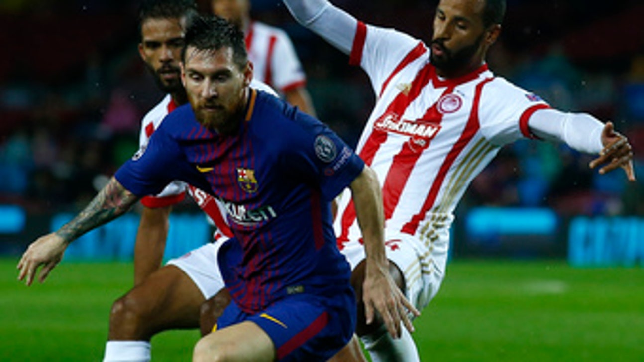 Messi nets 100th goal in Europe, Barca beats Olympiakos 3-1