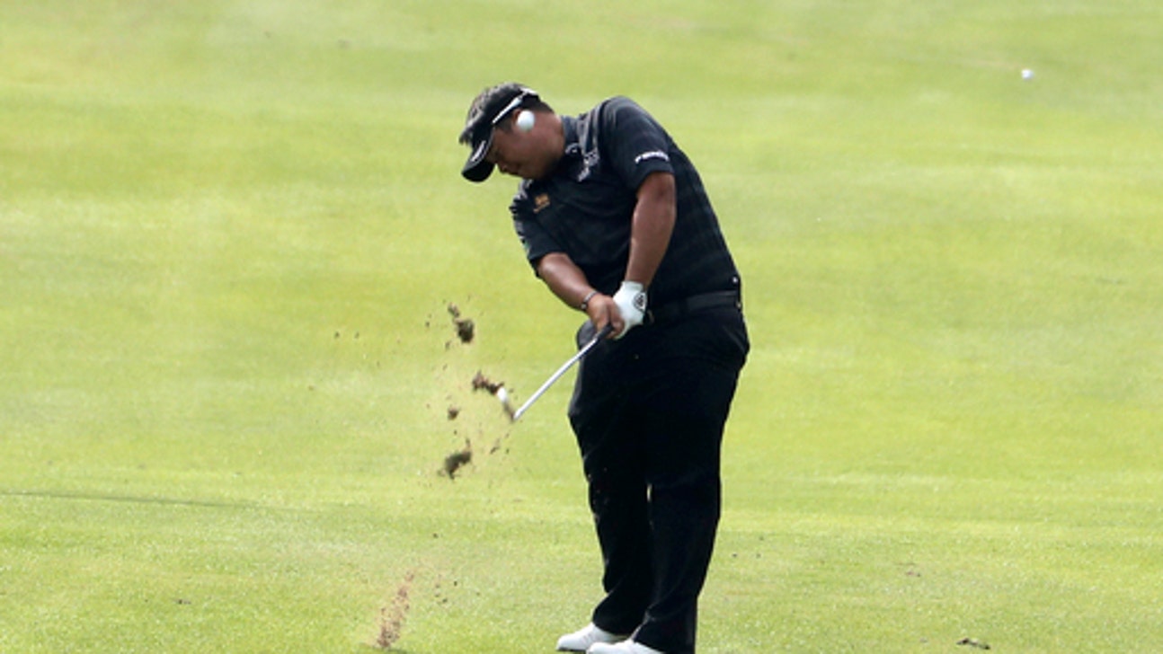 Thai golfer motivated by funeral for king and starts strong