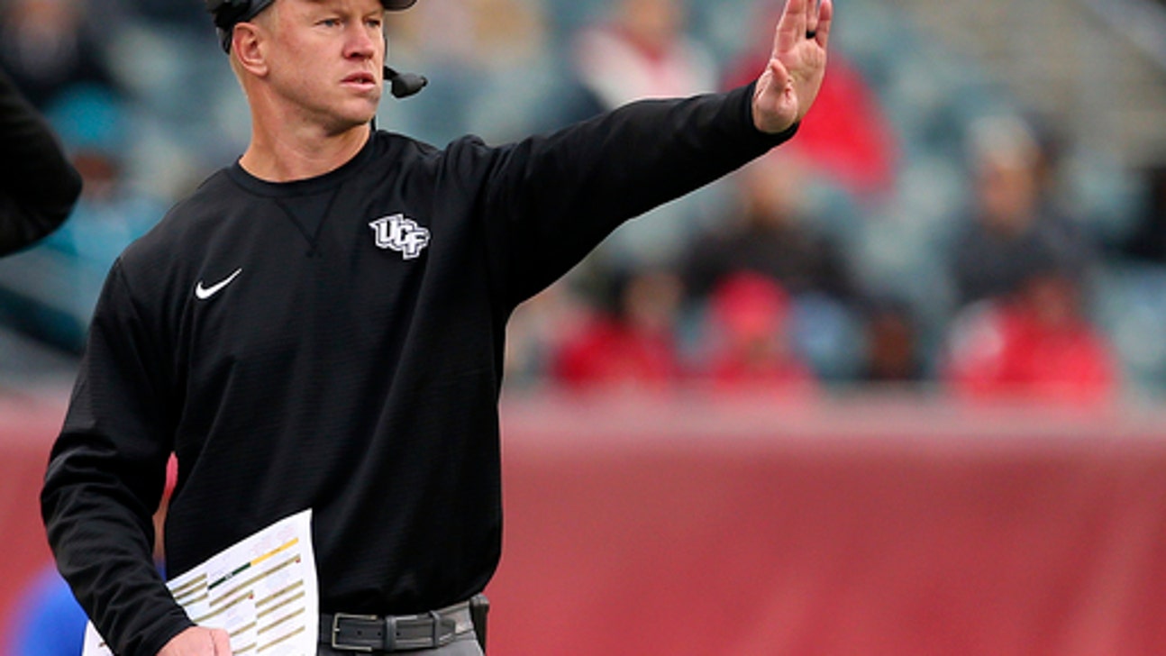 Frost, assistants busy coaching UCF, recruiting for Nebraska