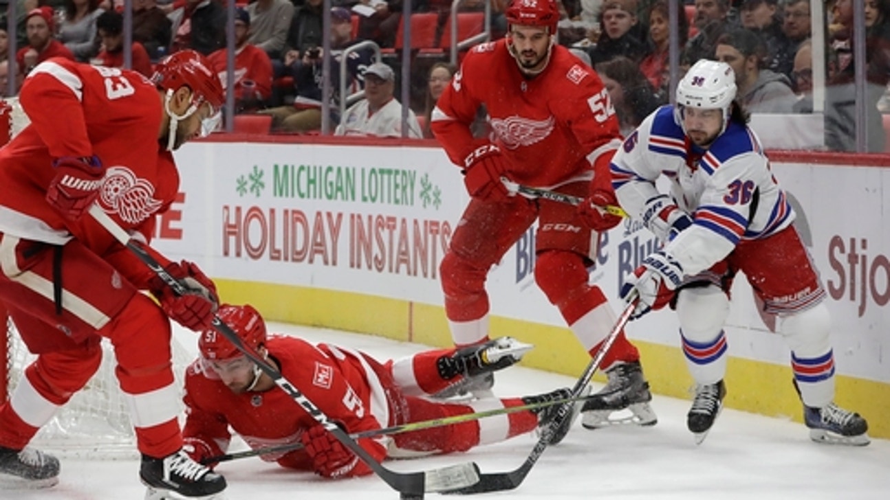 Kane's OT goal gives 32-year-old Chicago goalie win in debut