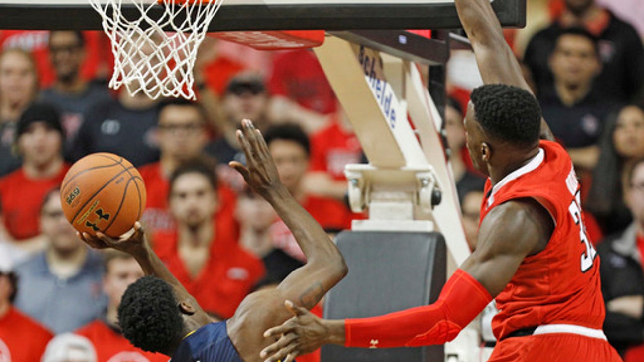Texas Tech fined, WVU's Harris reprimanded after court-storm