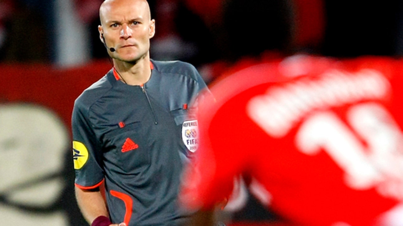 French federation suspends referee who kicked Nantes player