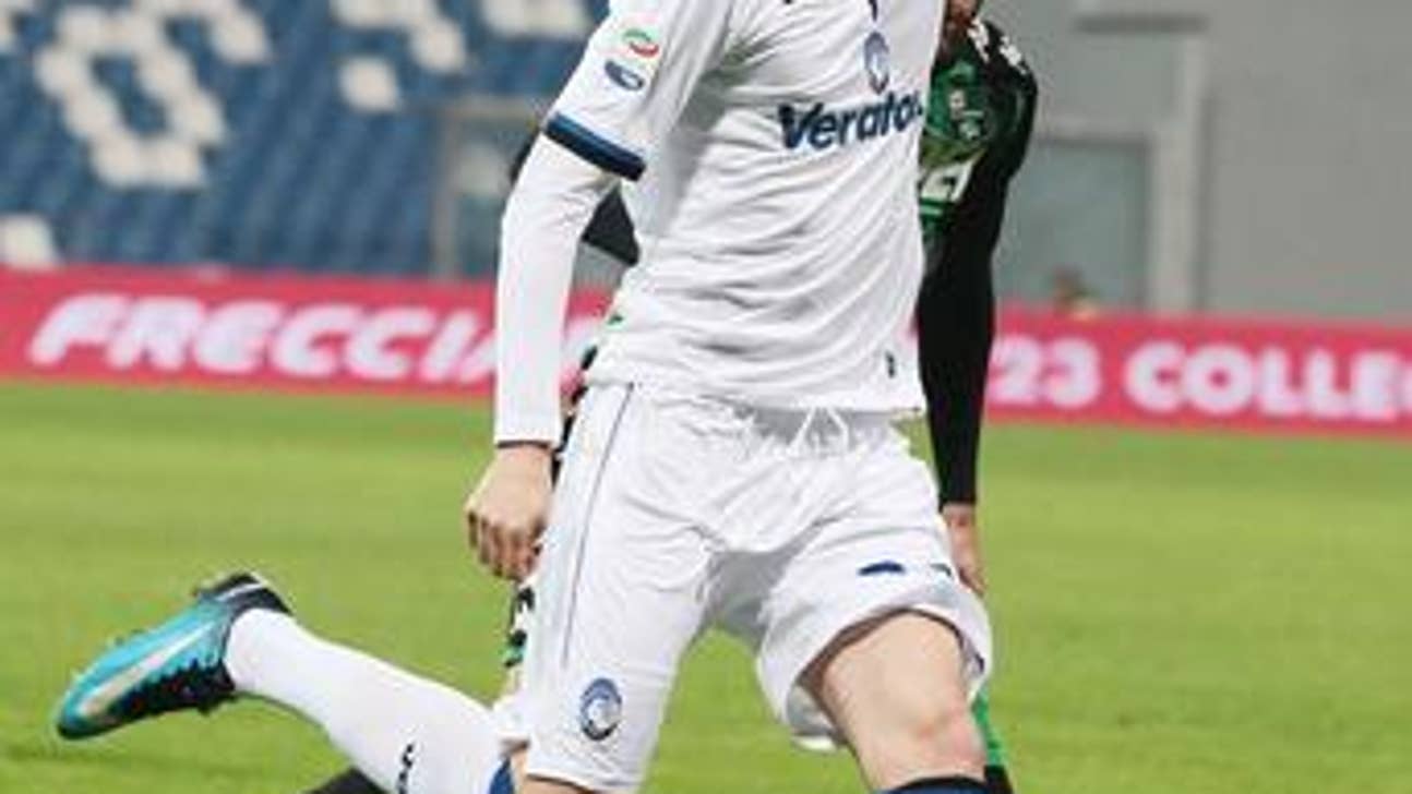 Juventus moves top of Serie A after beating 9-man Chievo 2-0