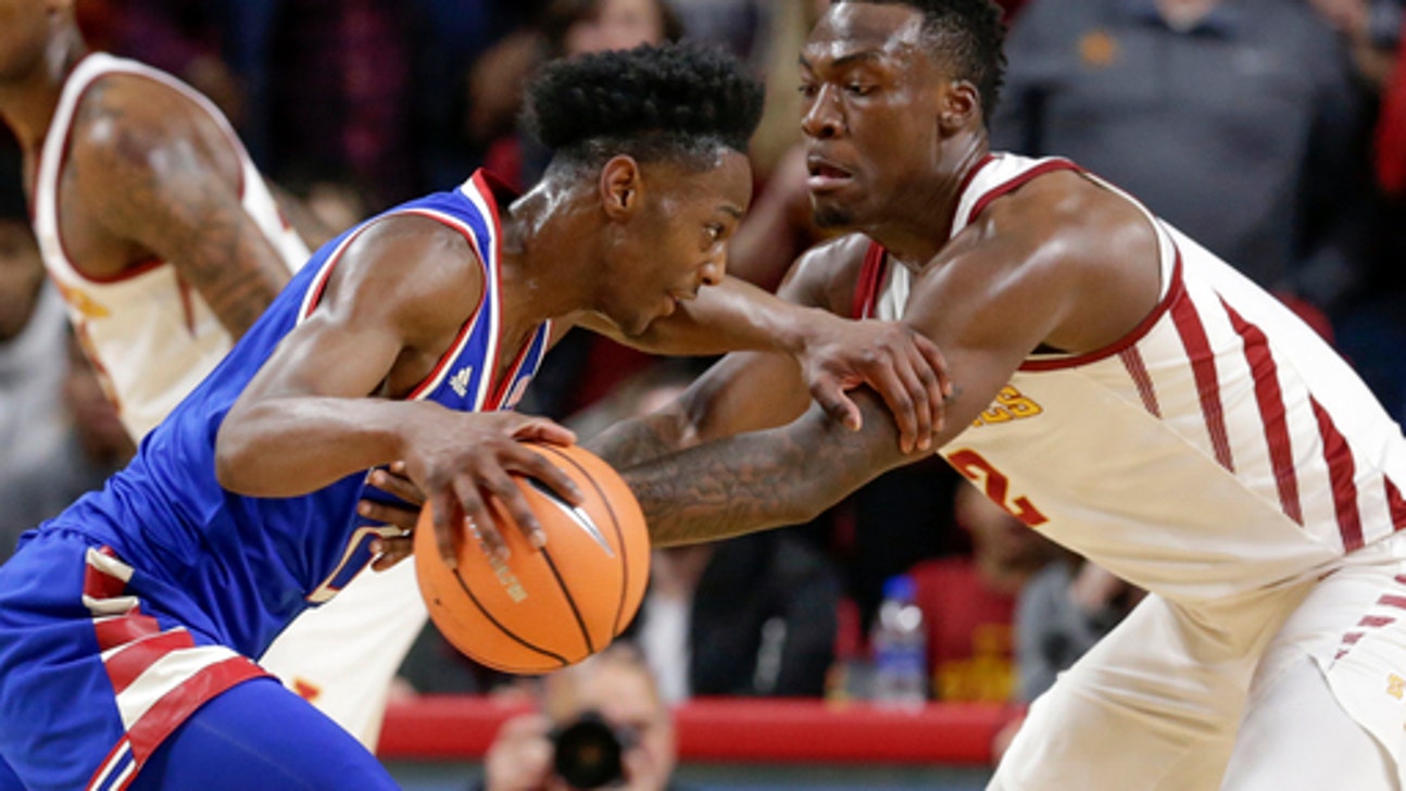 No. 13 Kansas holds off Iowa State 83-77