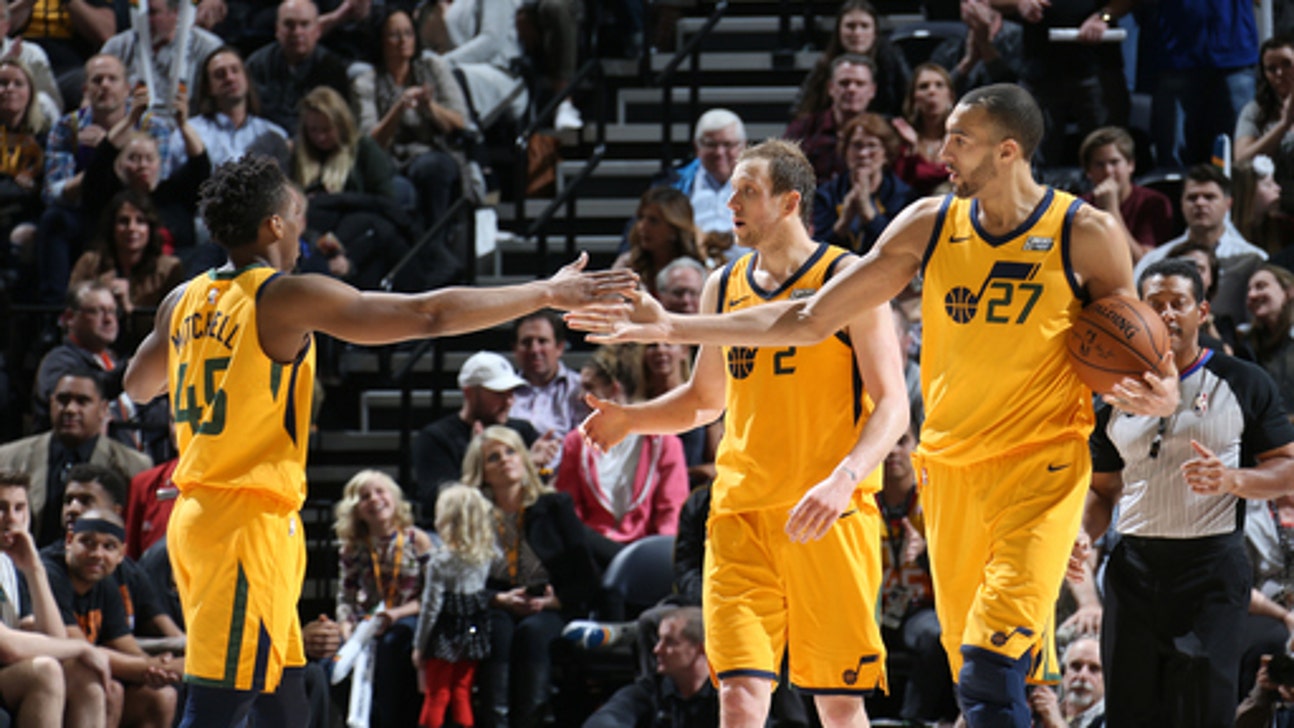 Jazz win 11th straight, beating Suns 107-97