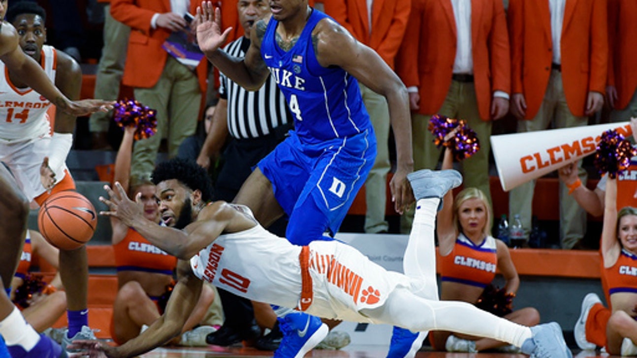 Trent leads No. 12 Duke to 66-57 win over No. 11 Clemson