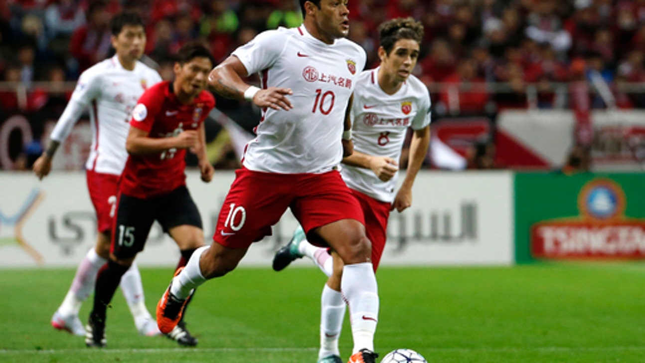 Chinese soccer teams hope to stop dominant Guangzhou