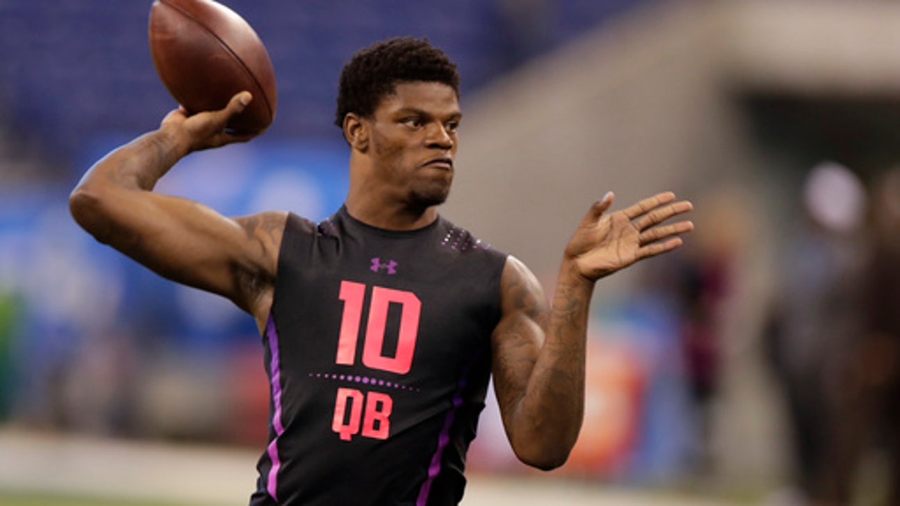 Louisville’s Jackson justifies staying at QB