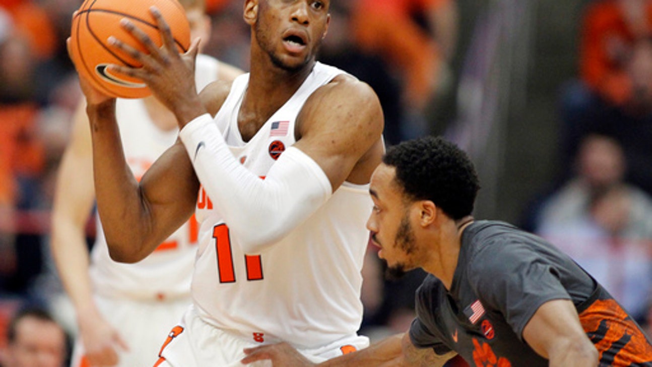 Battle scores 17, Syracuse beats No. 18 Clemson 55-52