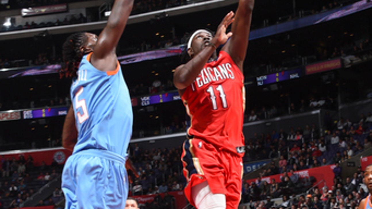 Holiday out with illness vs. Mavs, Hill starting