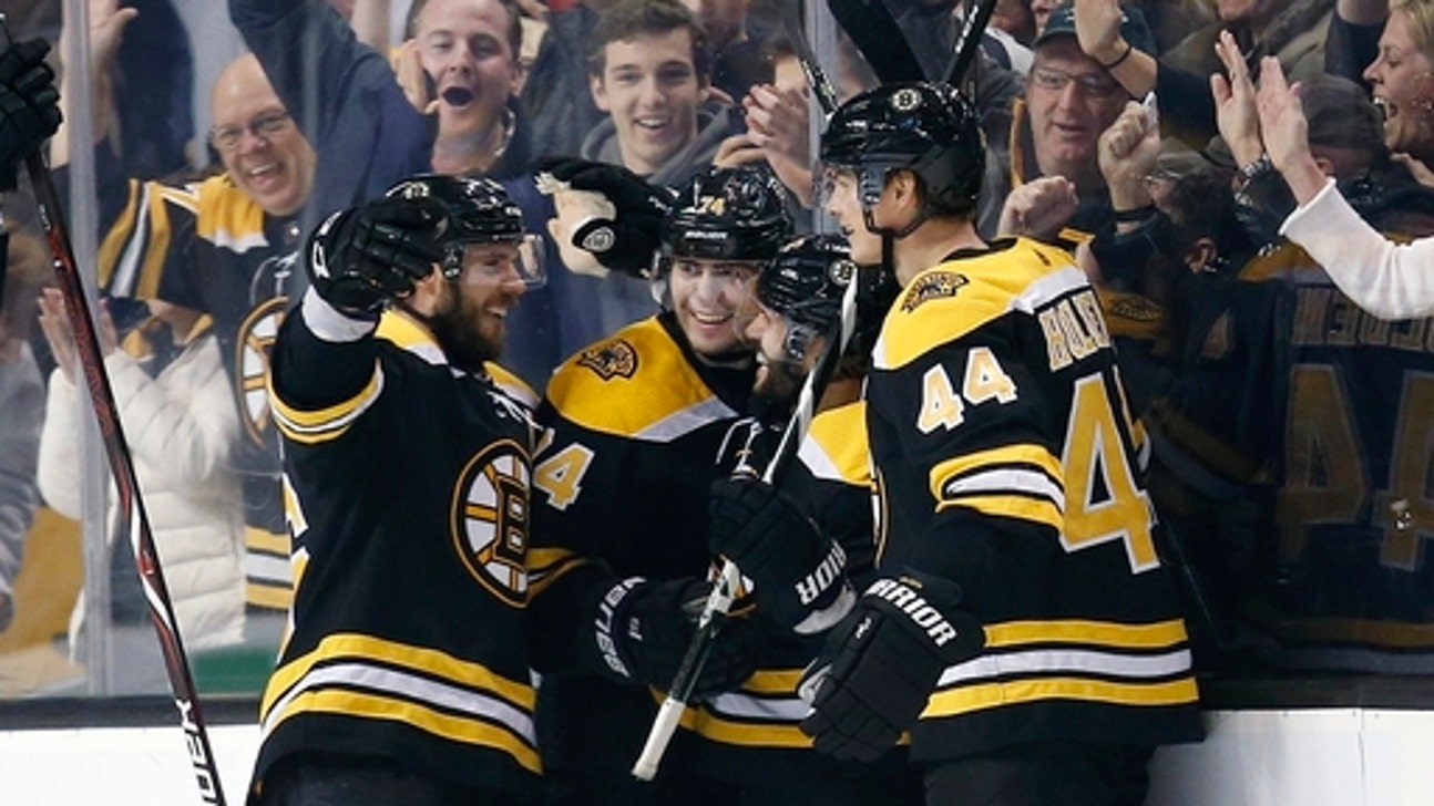 Gionta, Rick Nash help Bruins power past Chicago 7-4