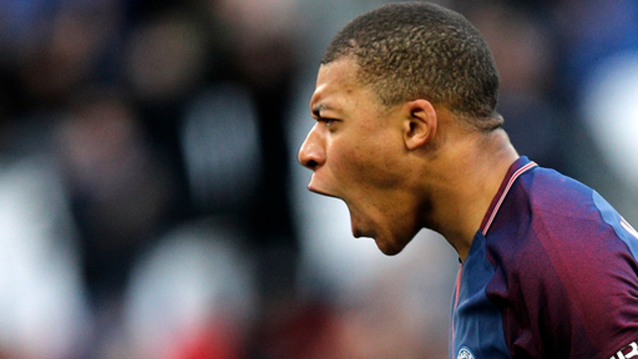 Mbappe scores twice as league leader PSG beats Angers 2-1