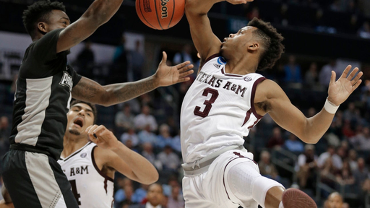 Texas A&M holds off Providence 73-69 in NCAA West 1st round