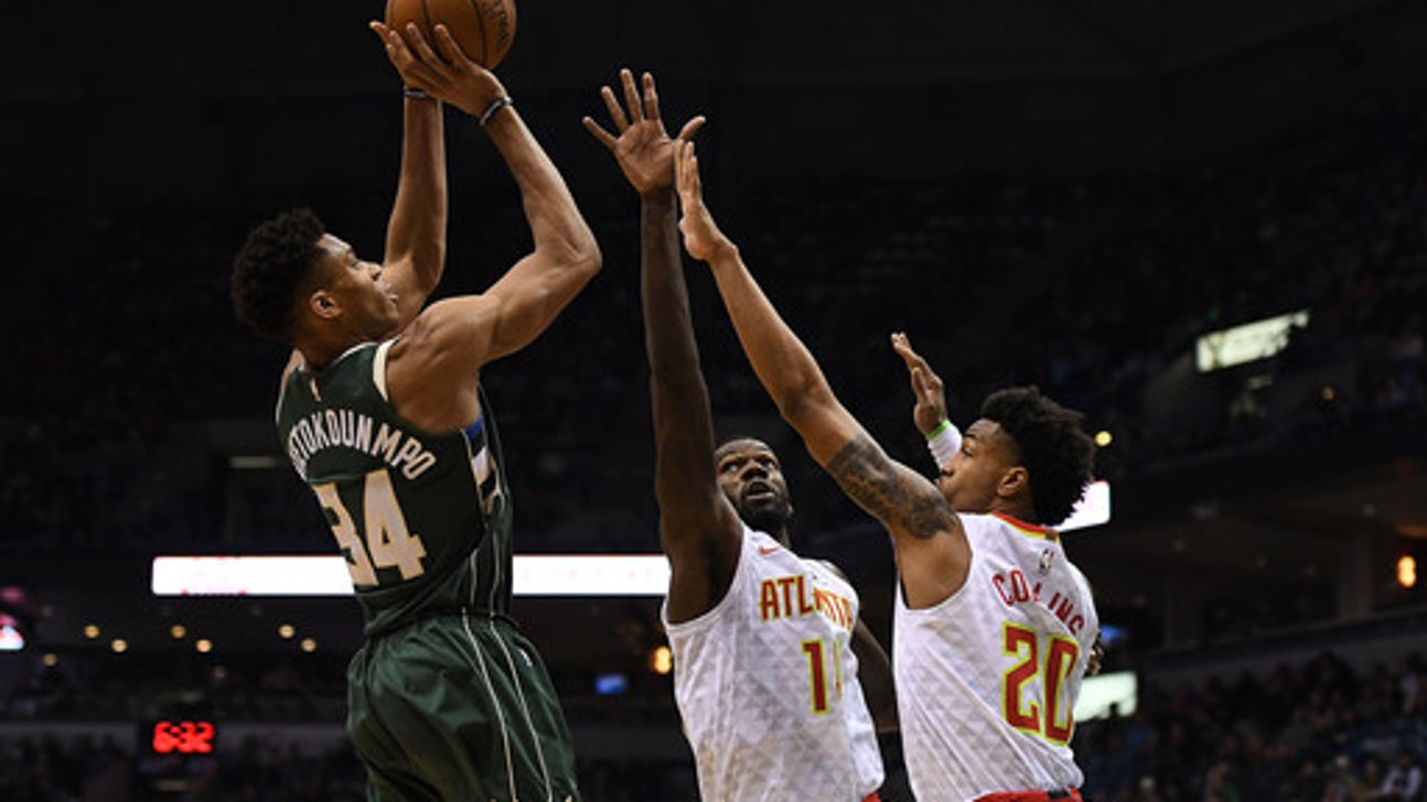 Giannis’ double-double helps Bucks hold on to beat Hawks