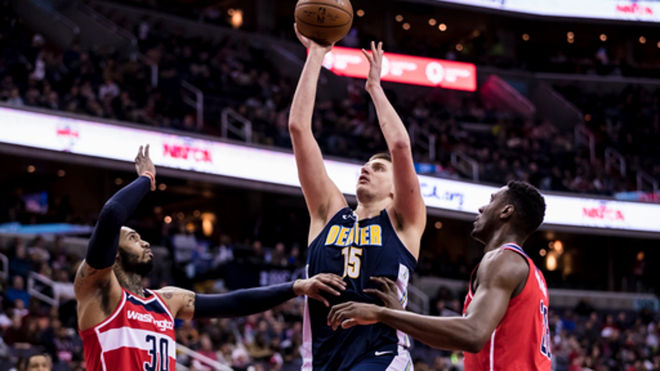 Jokic, Murray help Nuggets stay in race by beating Wizards