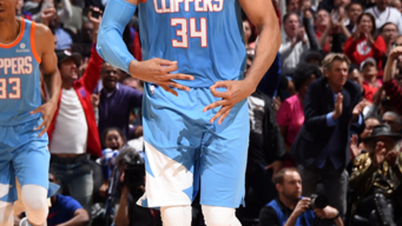 Clippers rally to beat Bucks 105-98, improve playoff hopes