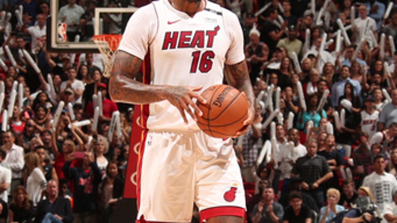x-Miami: Heat clinch playoff spot, top Hawks 101-98