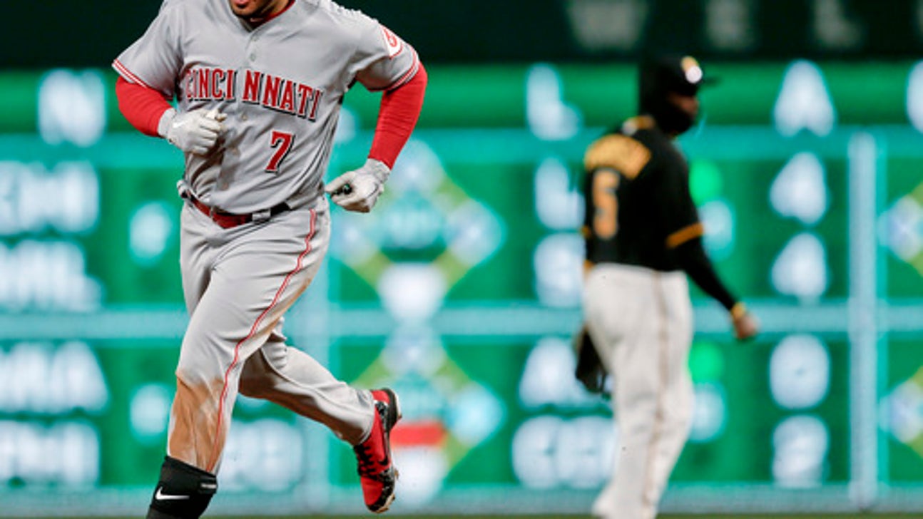 Suarez powers Reds past Pirates 7-4