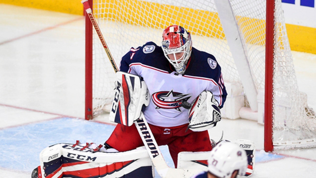 Calvert scores in OT, Blue Jackets up 2-0 on Caps in series