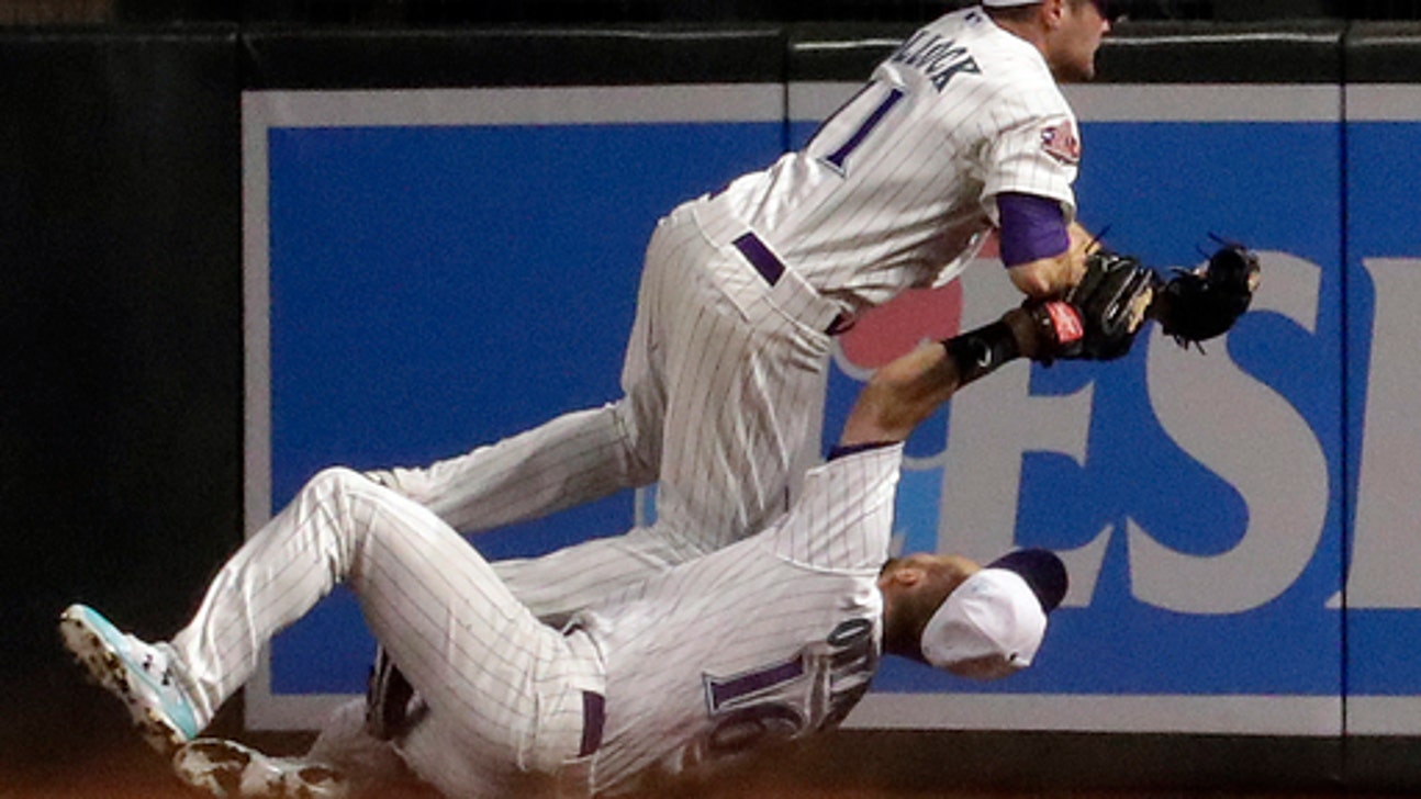 Diamondbacks' Owings injured in collision with Pollock