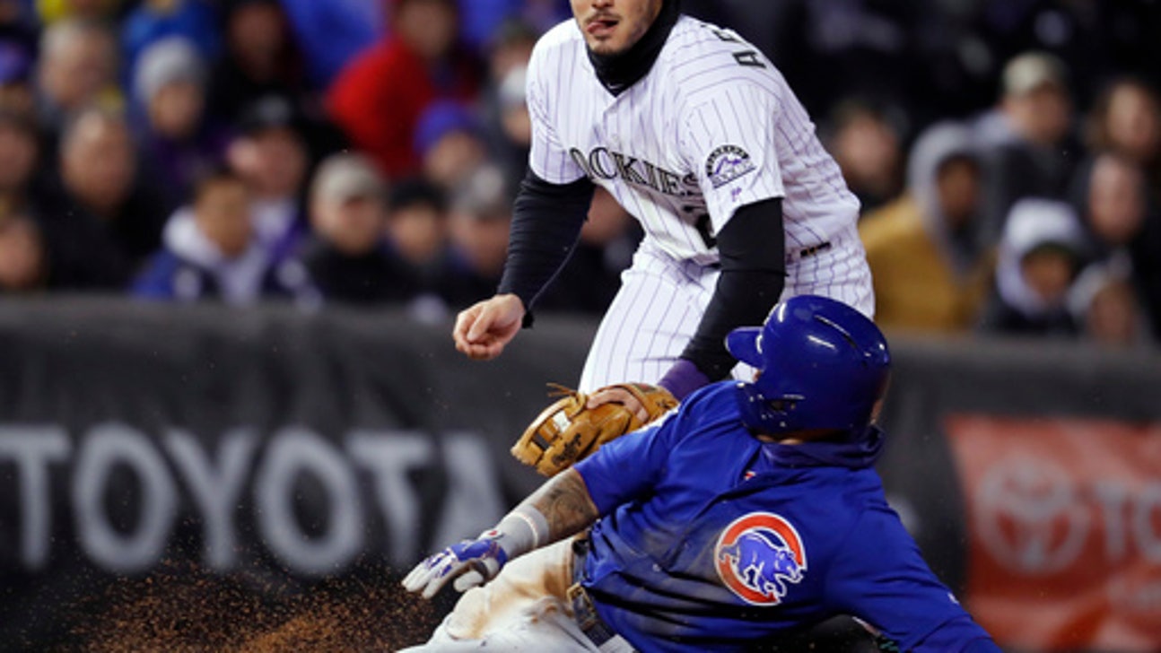 Baez, Schwarber homer, Cubs beat Rockies 16-5
