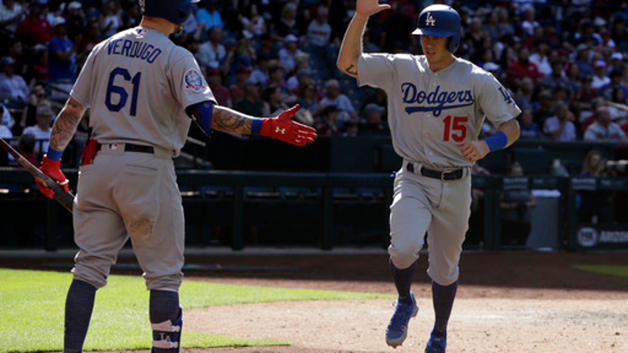 Dodgers rally on pair of wild pitches, beat D-backs 5-2