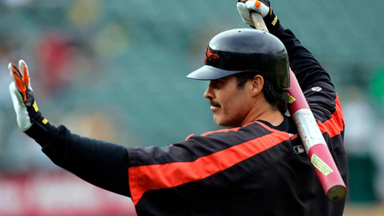 Palmeiro signs with independent team at age 53 with his son