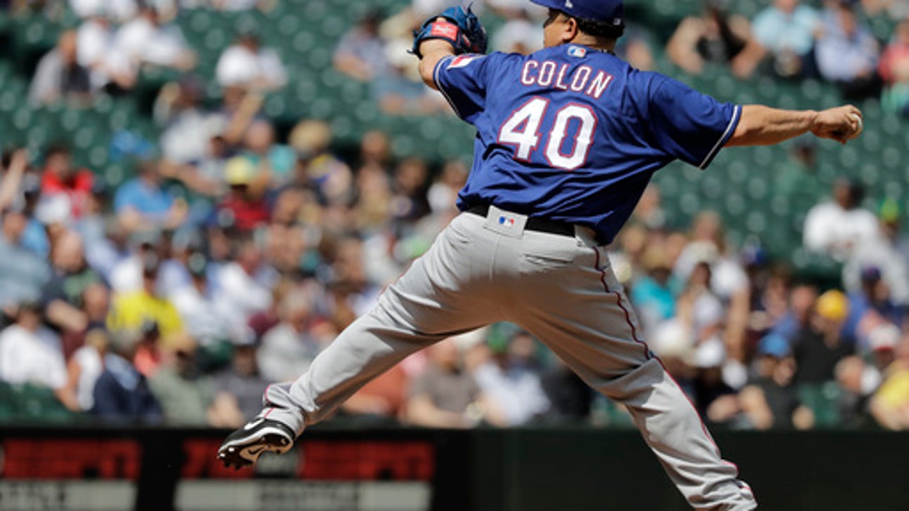 Colon shakes off liner to stomach, Rangers beat Mariners 5-1