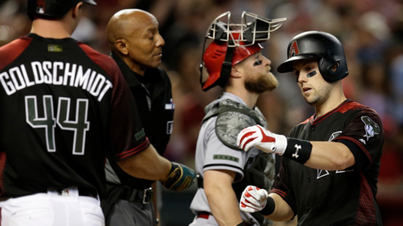 D-backs hit 3 HRs, offense erupts for 12-5 win over Reds