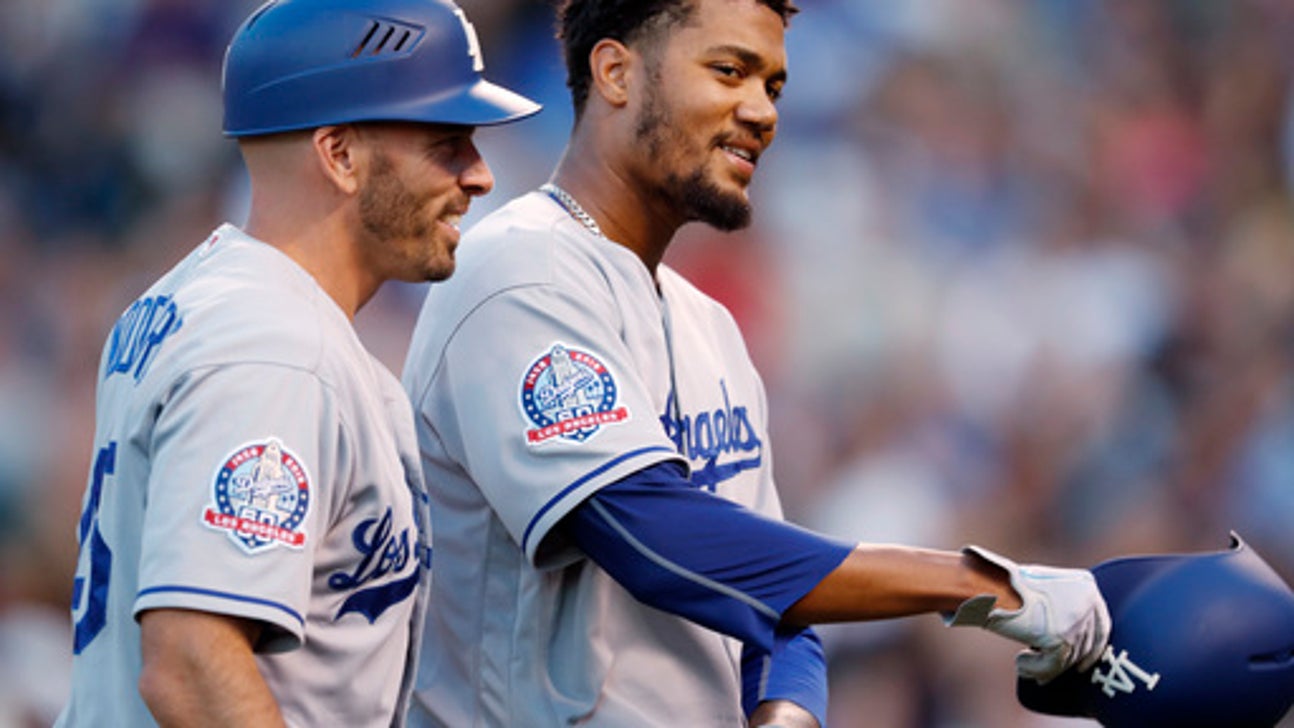 Santana picks up win in debut, Dodgers beat Rockies 11-8
